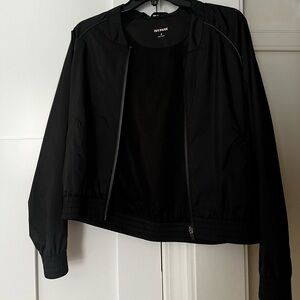 Black bomber jacket; cute for a workout fit